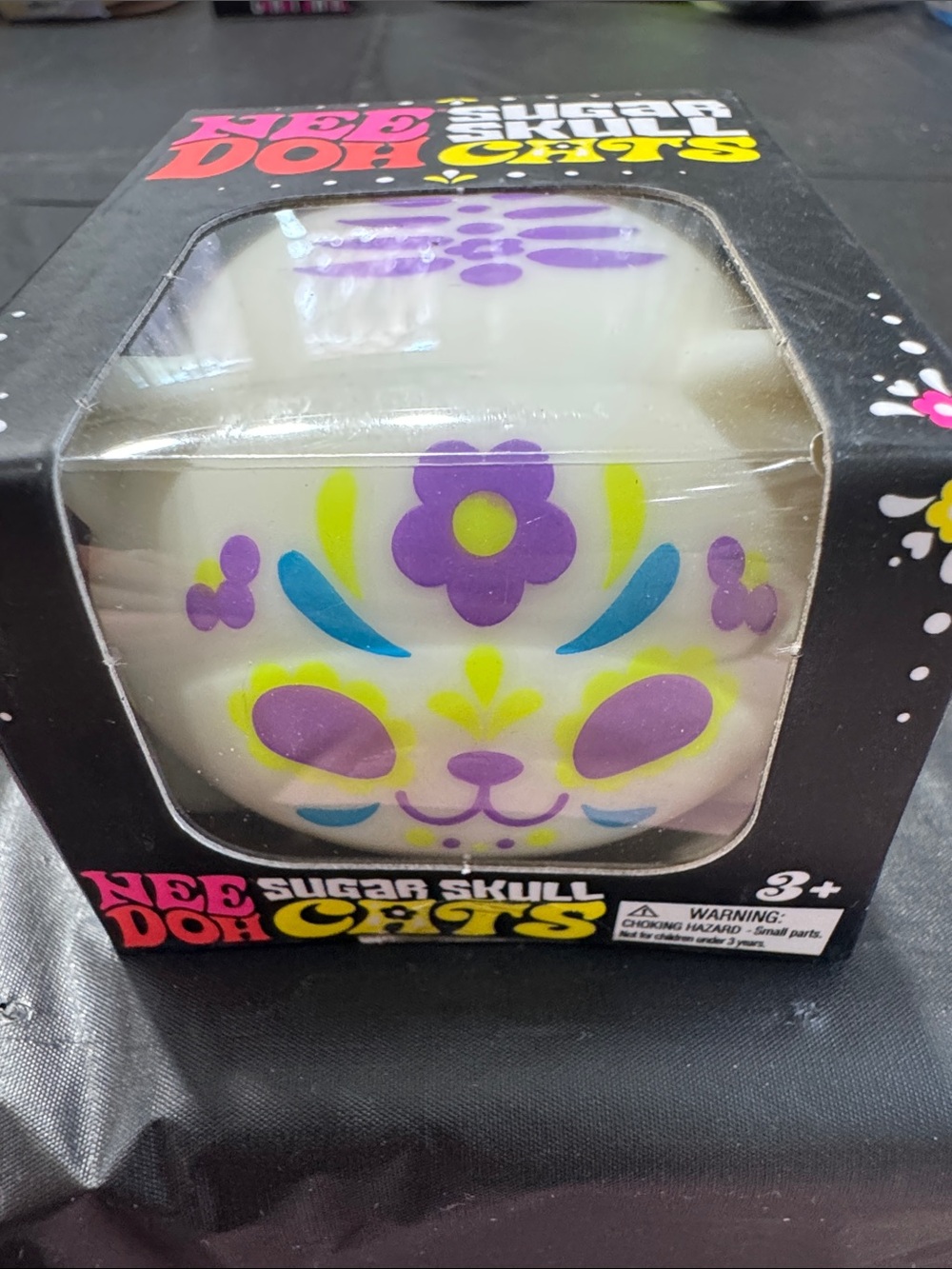 NeeDoh Sugar Skull Cats Squeeze Toy - White with Purple, Yellow, & Blue Design